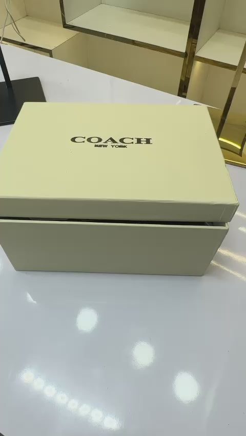 Signature coated canvas and smooth leather