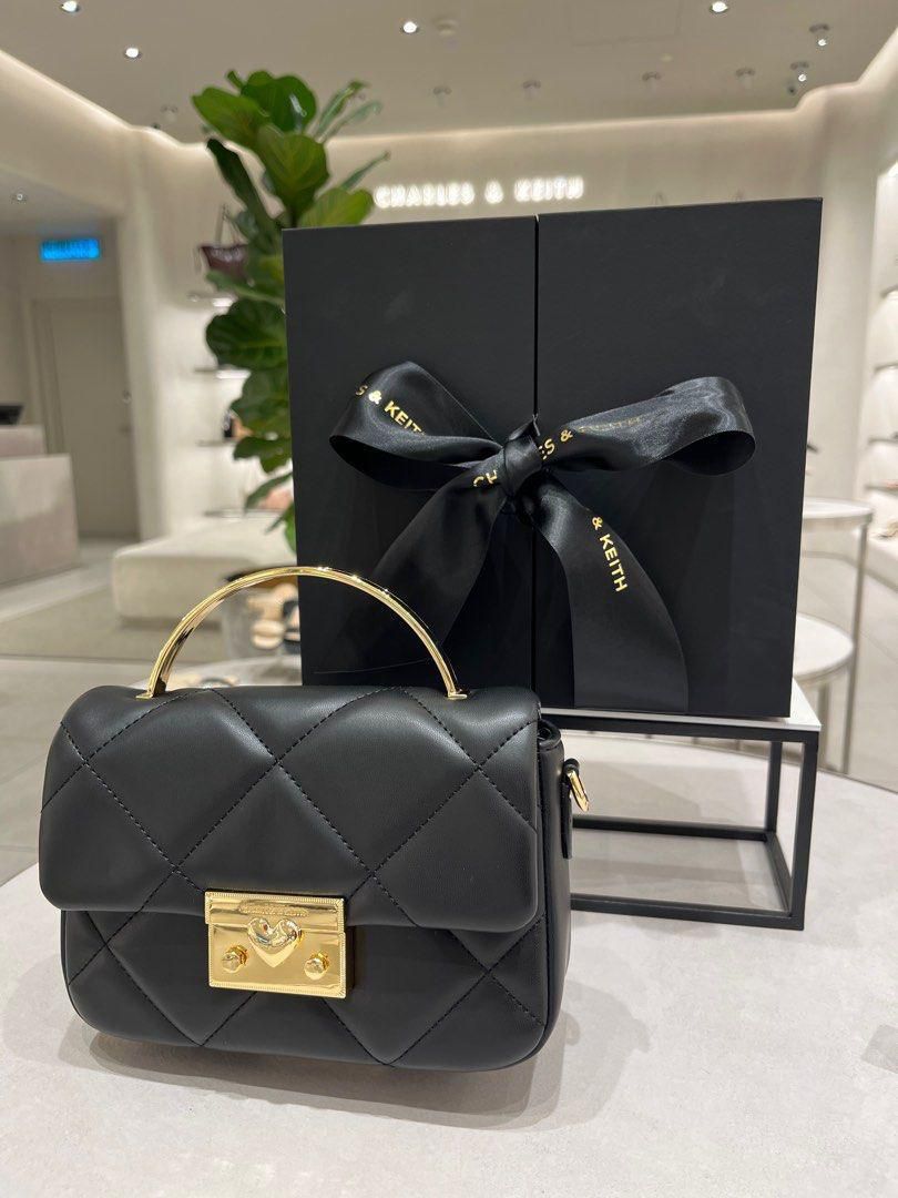 C&K boxy quilted top handle bag