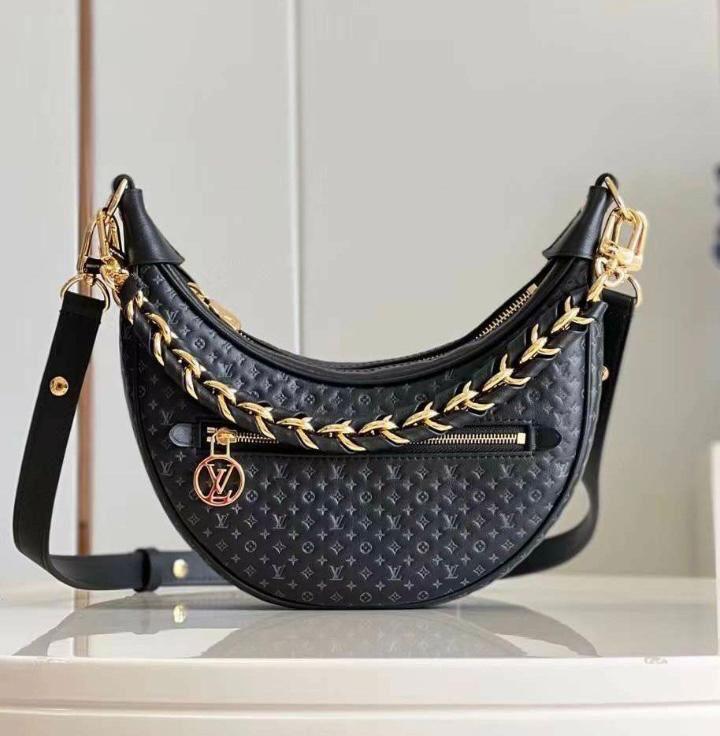 Vintage loop embossed shoulder cum sling bag