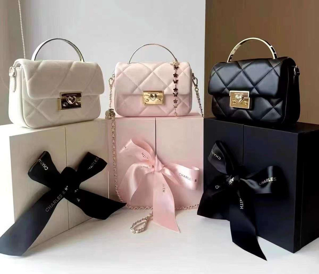 C&K boxy quilted top handle bag