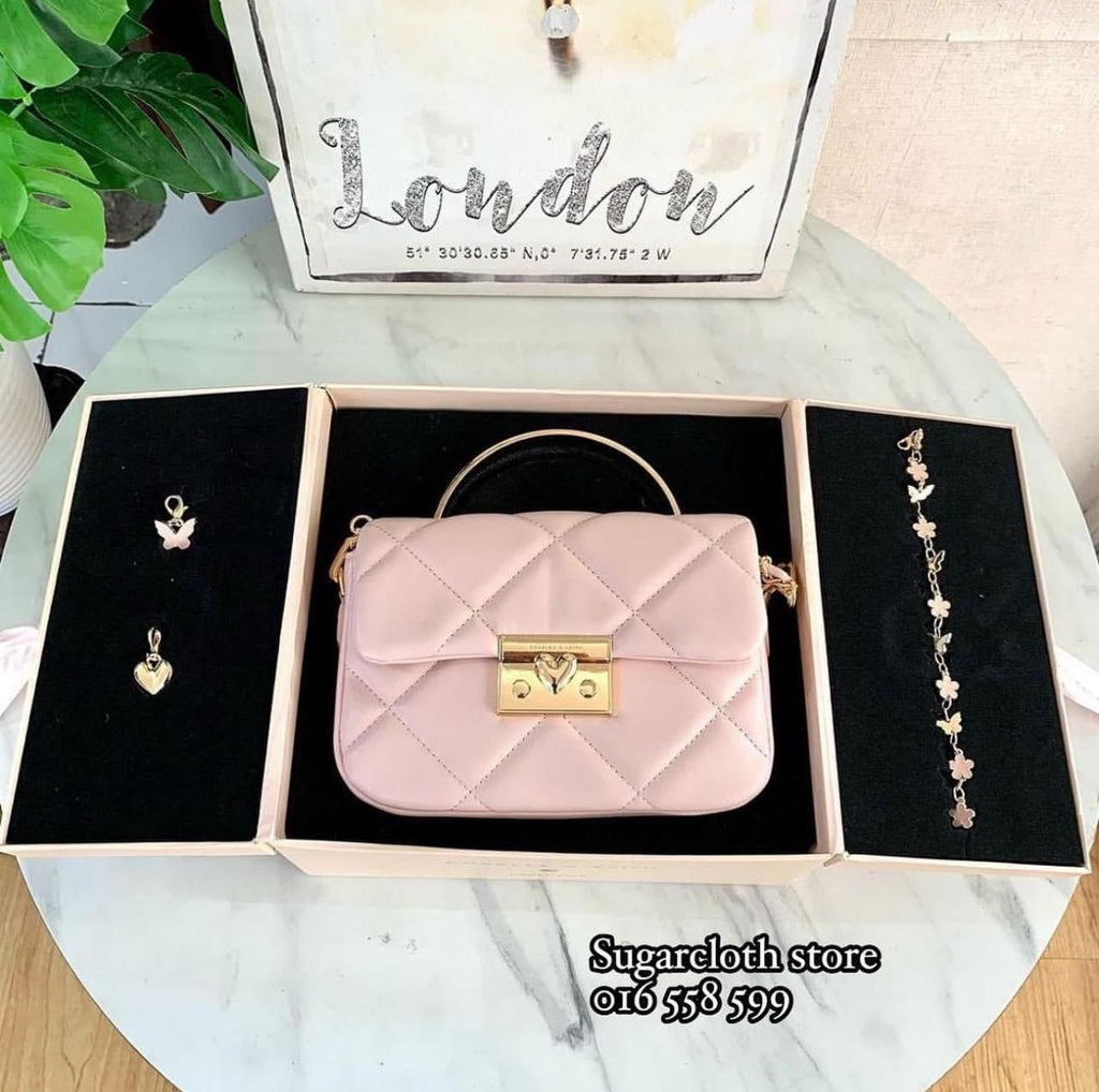 C&K boxy quilted top handle bag