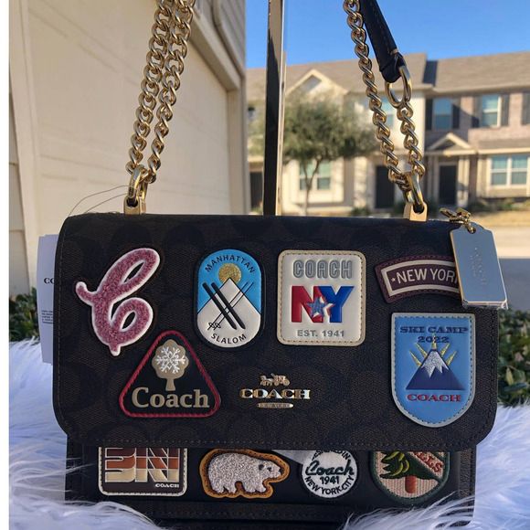 Signature coated canvas and smooth leather