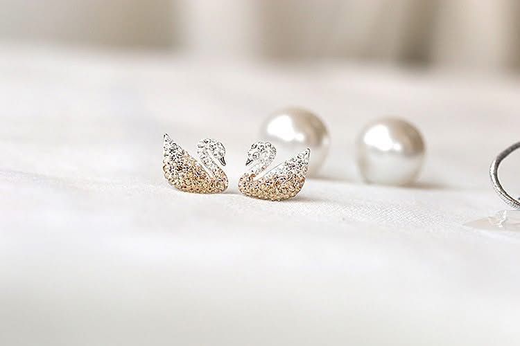 Swarovski signature pearl swan earrings