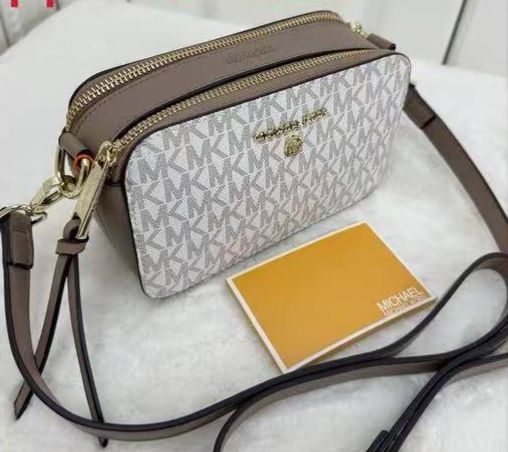 MK SNAPSHOT SLING BAG