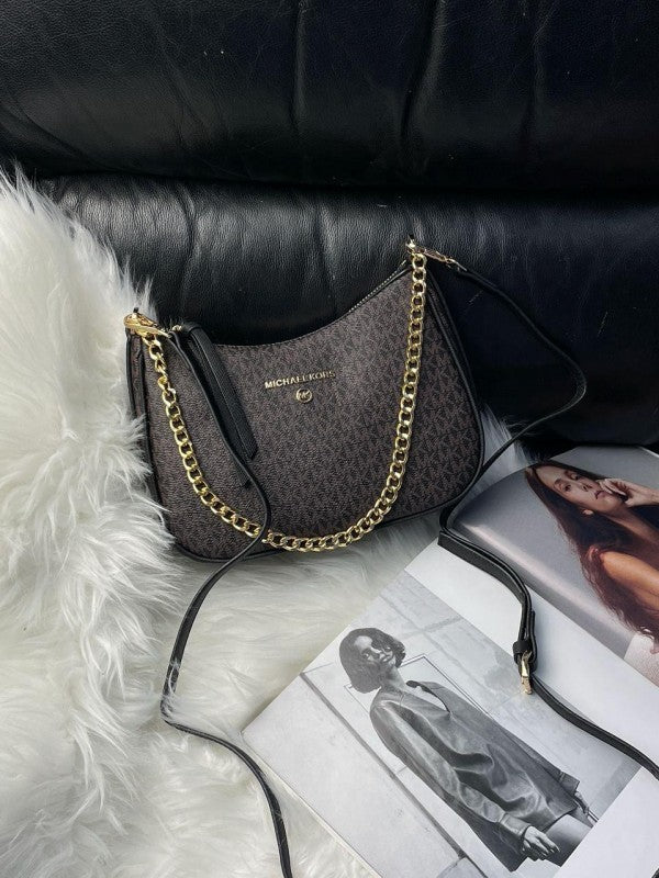 Jet set charm shoulder bag