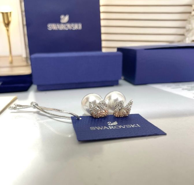 Swarovski signature pearl swan earrings