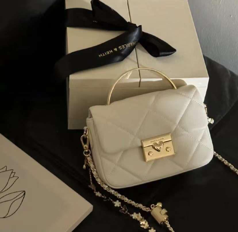 C&K boxy quilted top handle bag