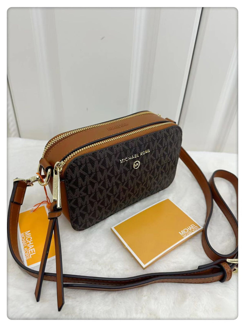 MK SNAPSHOT SLING BAG