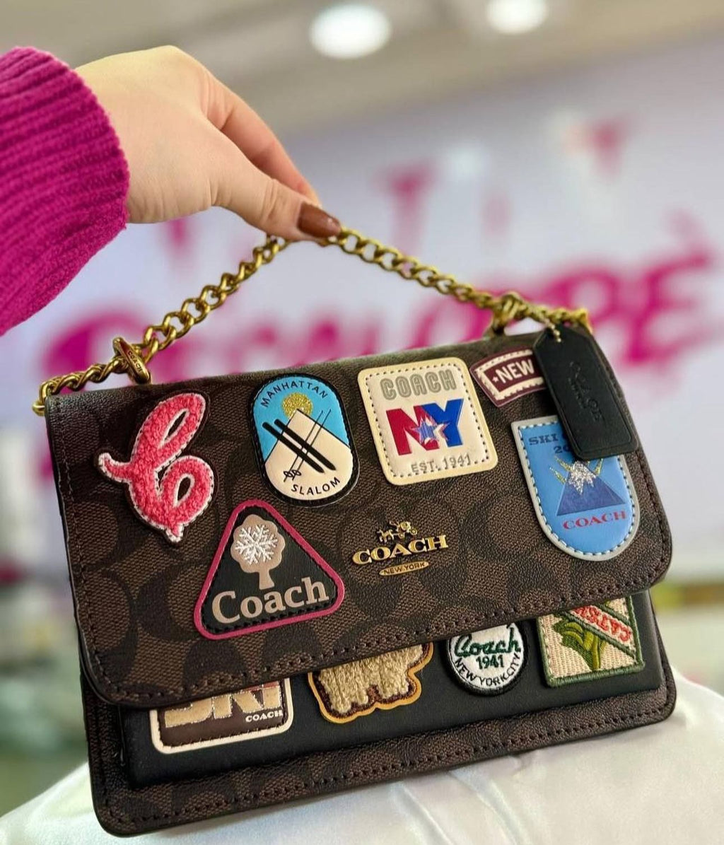 Signature coated canvas and smooth leather