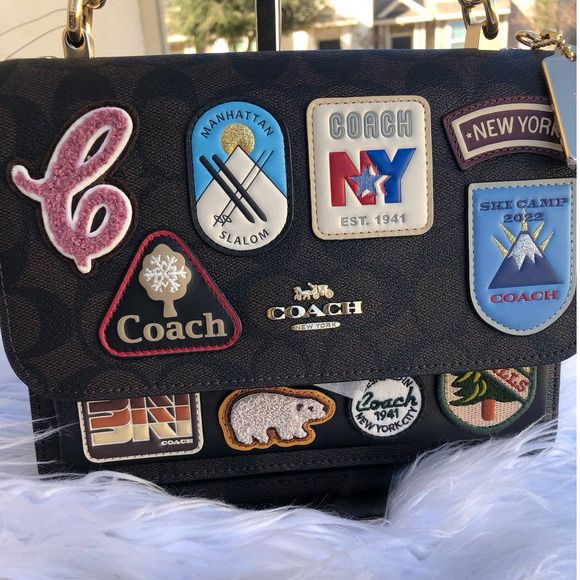 Signature coated canvas and smooth leather