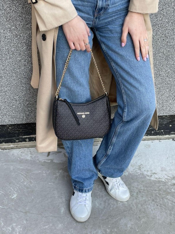 Jet set charm shoulder bag