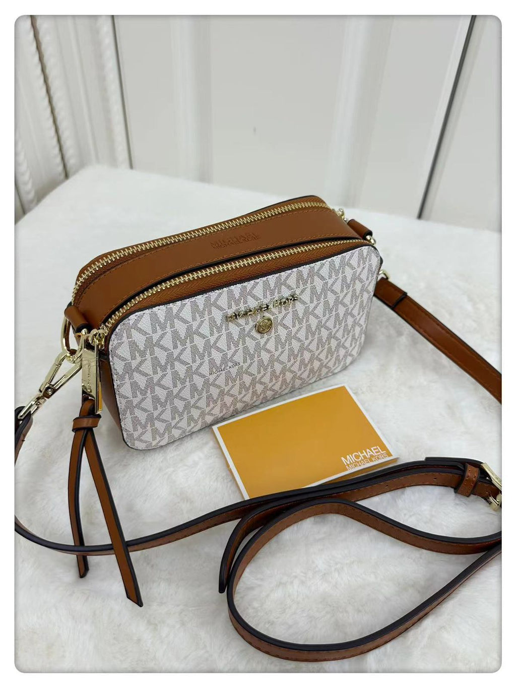 MK SNAPSHOT SLING BAG