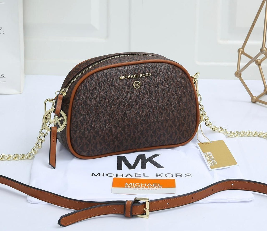 Jet set charm sling bags